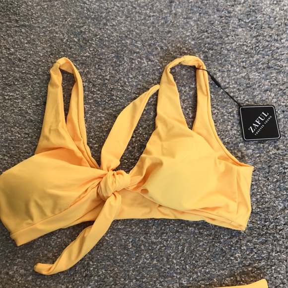 Yellow bathing suit. - Picture 3 of 4